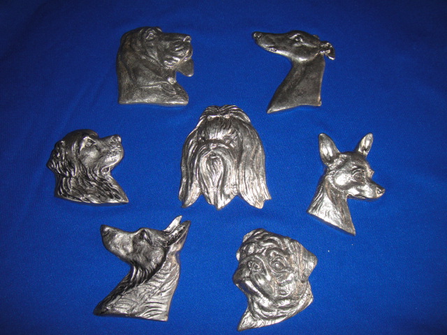 Handcrafted pewter dogheads